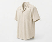 Men's loose fit short sleeve button-up shirt in beige with chest pocket and breathable fabric