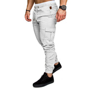 Slim fir cargo joggers for men in light gray color, styled with a fitted silhouette and paired with black sneakers.