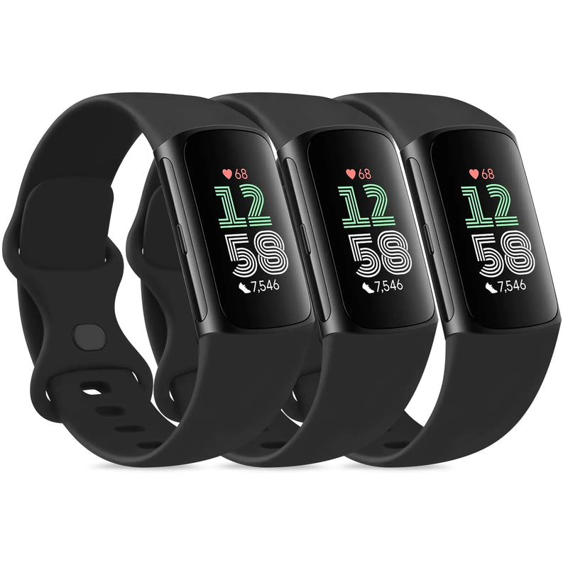 Four black fitness trackers with digital displays on a white background