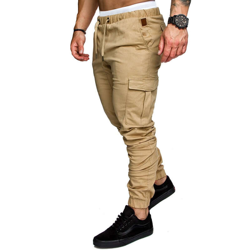 Slim fir cargo joggers for men displayed on a model wearing black sneakers and a watch.