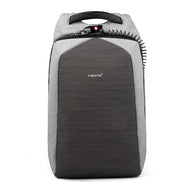 Light grey anti-theft laptop backpack with dark front panel and integrated security lock.