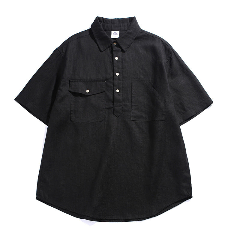 Black men’s retro workwear polo shirt with multi-pocket detail and loose fit style