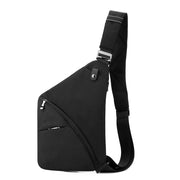 Black tactical sling bag made for right-shoulder carry, featuring durable fabric, a curved front zipper, and adjustable strap.