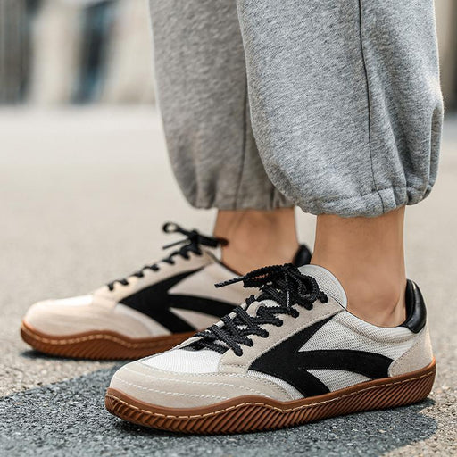 Men wearing breathable white and black mesh sneakers