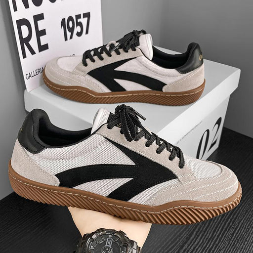 White and black low top casual trainer sneakers for men