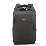 Front view of a black-grey anti-theft laptop backpack with hidden zipper design and minimalist structure, fits 15.6-inch laptops.
