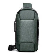 Green sport-style sling bag with scratch-resistant fabric and anti-theft zipper design.
