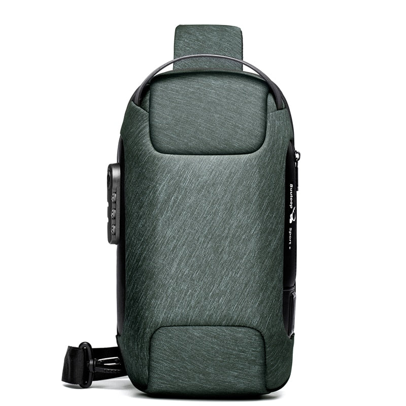 Green sport-style sling bag with scratch-resistant fabric and anti-theft zipper design.