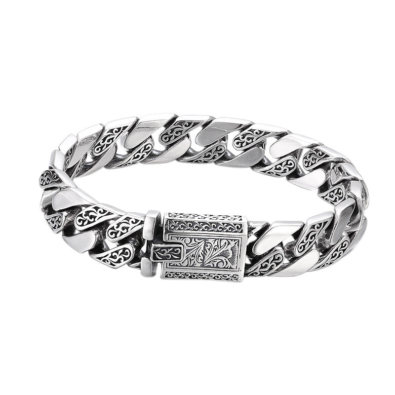 Vintage 925 silver Cuban link bracelet with engraved pattern
