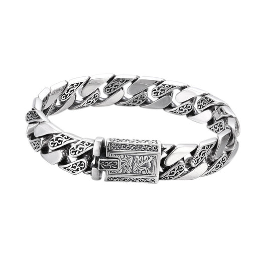 Vintage 925 silver Cuban link bracelet with engraved pattern
