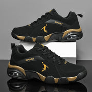 Black and gold men’s leather athletic shoes with durable sole for daily wear