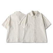 Front and back view of beige men’s short sleeve casual shirt with loose fit silhouette