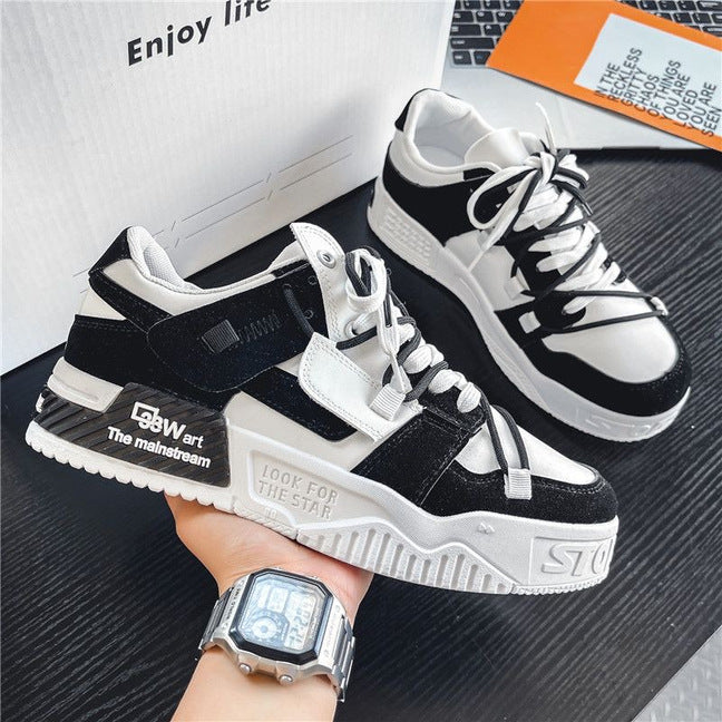 Side view of men’s black and white outdoor sneakers with non slip rubber sole