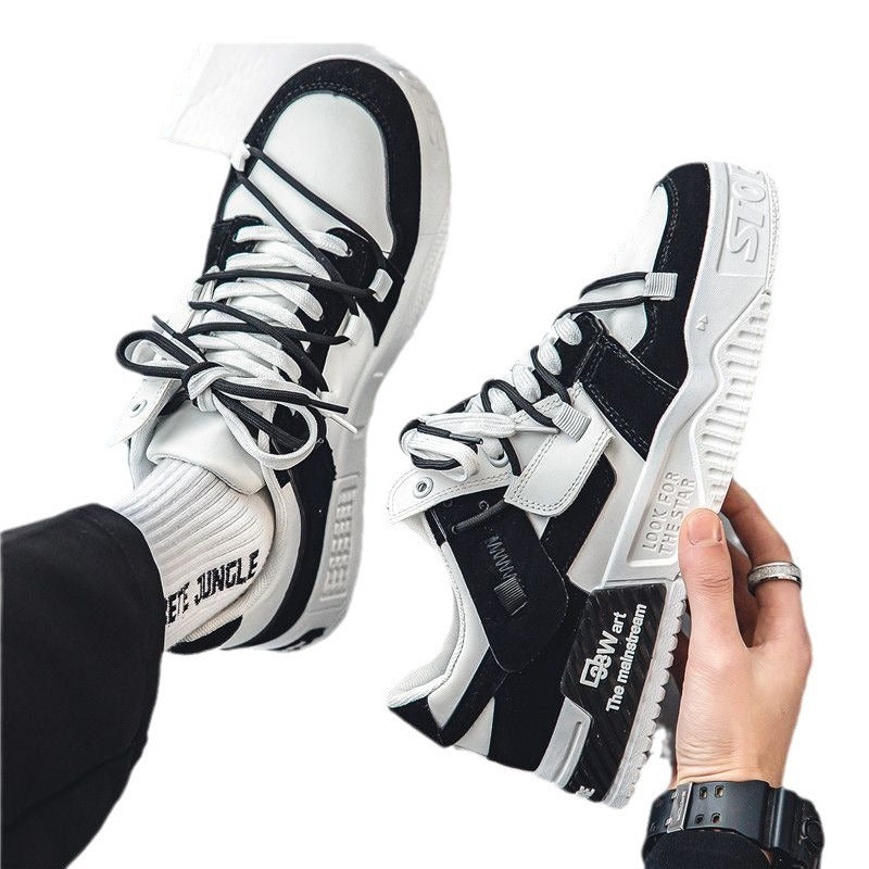 Pair of men’s black and white non slip sneakers for walking hiking and casual sports