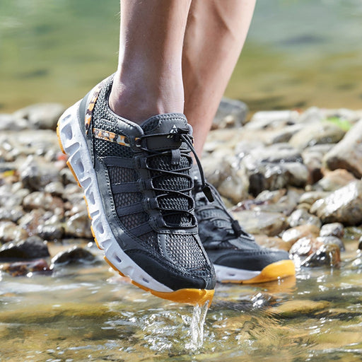 Men’s non-slip water shoes in motion, quick-dry athletic footwear for river trekking and outdoor activities