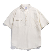 Men’s off-white retro workwear polo shirt with loose fit and multi-pocket casual design