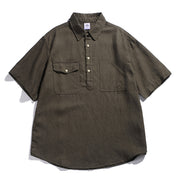 Olive green men’s loose fit workwear polo shirt with vintage utility pocket design