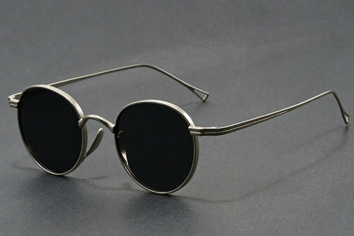 Silver frame round sunglasses with full gray lenses