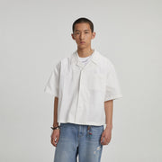 Men’s white loose fit Cuban collar shirt with lightweight summer casual style
