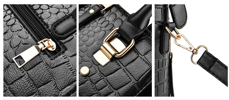 Close-up details of black crocodile handbag featuring gold zipper, buckle, and detachable shoulder strap hardware
