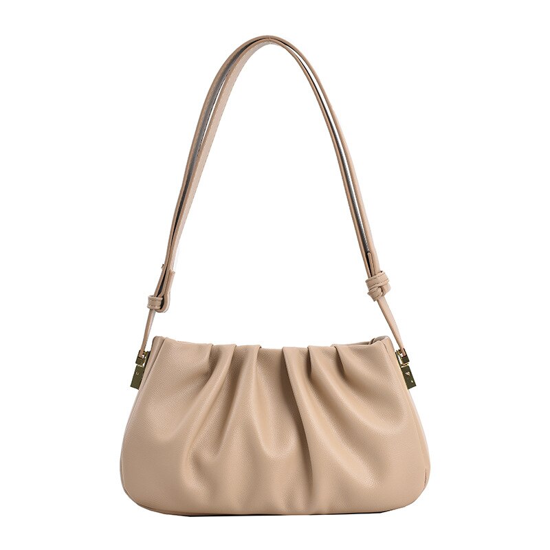 Apricot cloud soft shoulder bag featuring a smooth pleated texture, adjustable strap, and versatile everyday fashion appeal.
