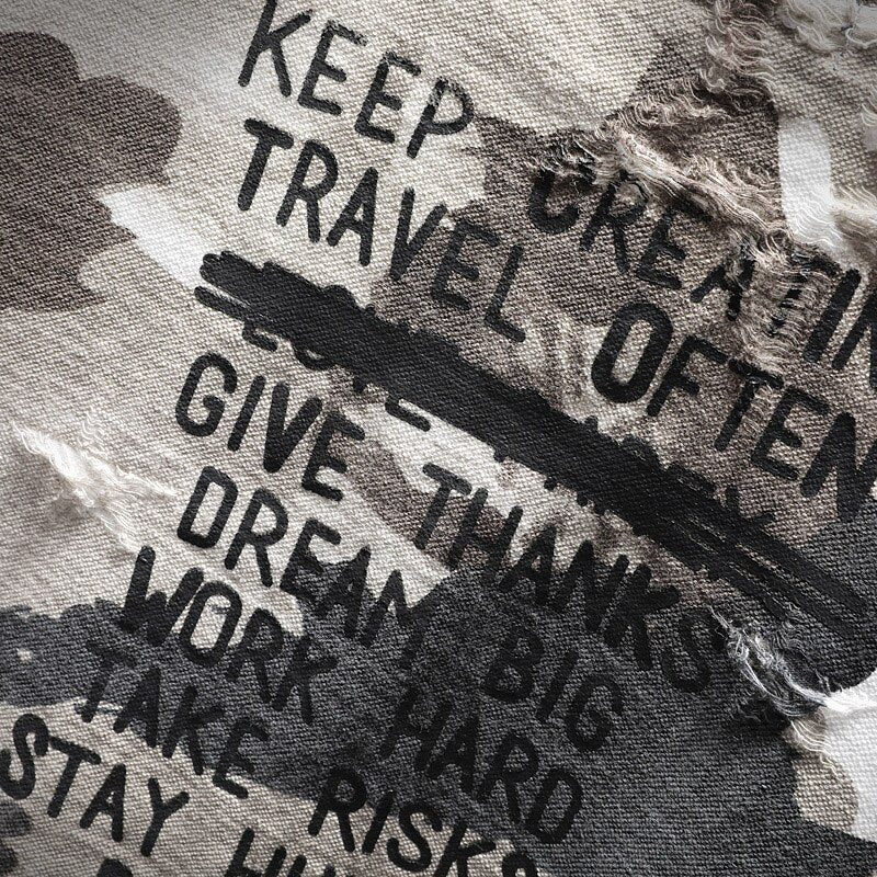 Close-up texture of distressed tactical camouflage shirt fabric