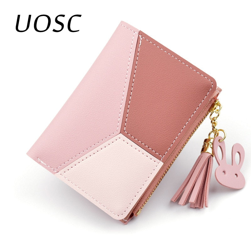 Geometric women's PU leather wallet with tassel pendant, card holder, and coin pocket.
