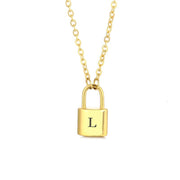 Gold initial lock necklace with letter L pendant on a minimal clean background 