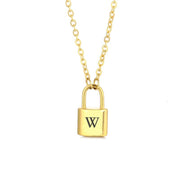 Gold initial lock necklace with letter W pendant on a minimal clean background 