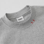 Close-up detail of gray cotton round neck T-shirt collar