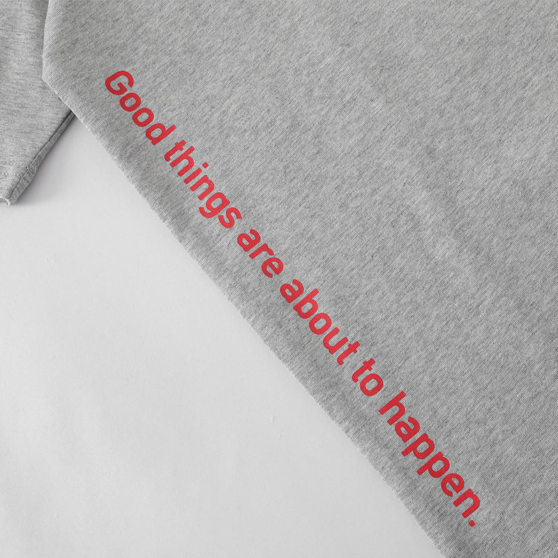 Motivational sleeve print on gray oversized men’s T-shirt