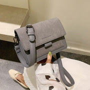 Blue gray Korean square crossbody bag with modern minimalist design
