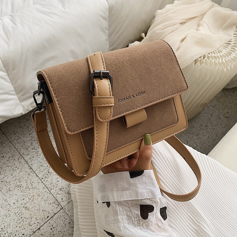 Brown Korean square crossbody bag with wide shoulder strap for everyday use
