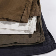 Fabric and hem detail of men's relaxed fit pocket t-shirt available in multiple color options
