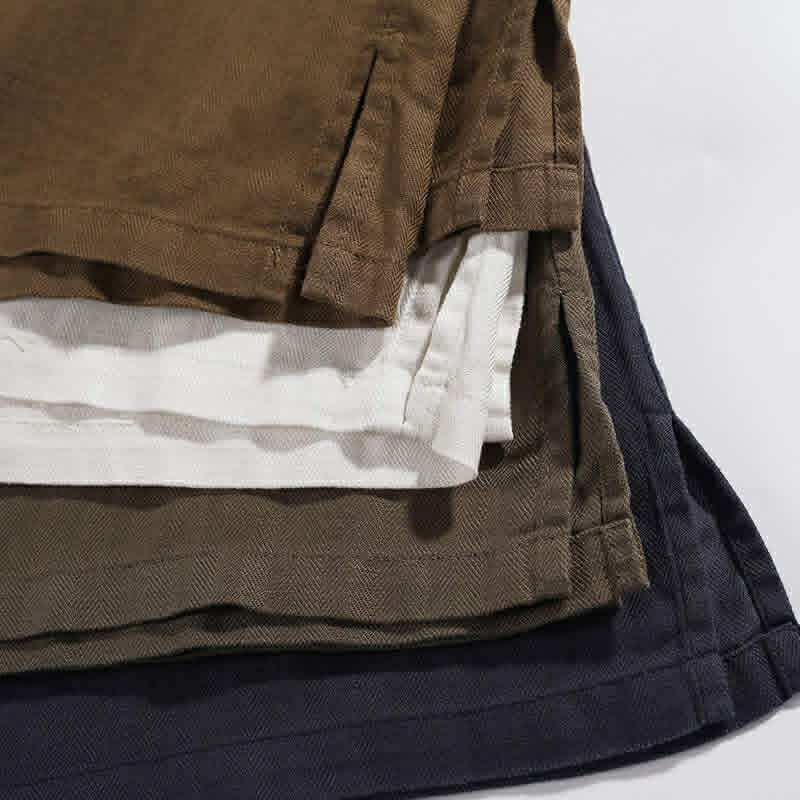 Fabric and hem detail of men's relaxed fit pocket t-shirt available in multiple color options
