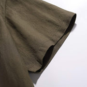 Short sleeve detail on men's relaxed fit cotton pocket t-shirt with clean finished hem
