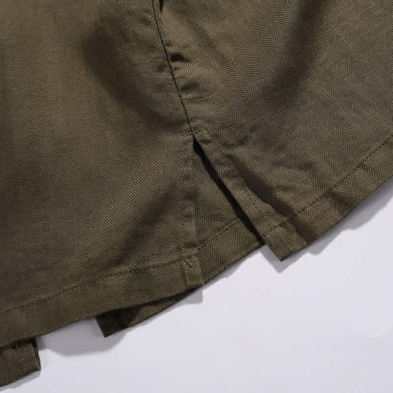 Side slit detail on men's relaxed fit cotton pocket t-shirt for improved comfort and mobility
