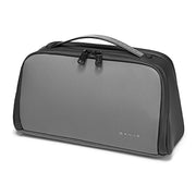 Gray waterproof travel cosmetic bag with spacious interior and modern minimalist design.
