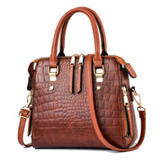 Khaki crocodile pattern handbag with gold hardware and detachable strap

