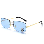 Blue lens square rimless sunglasses with gold frame and crystal bridge detail
