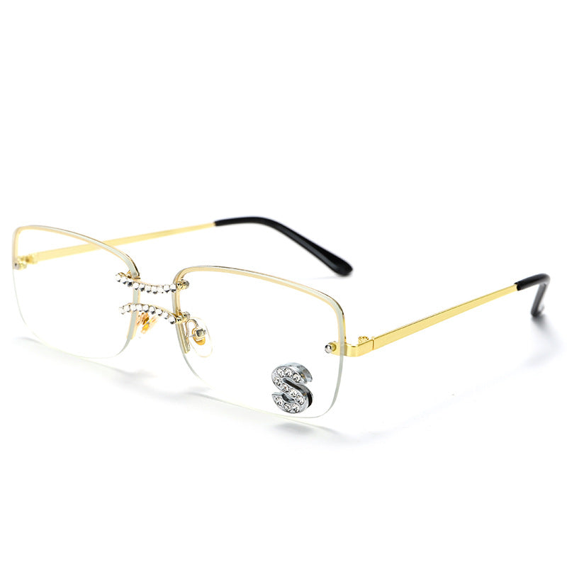 Clear lens square rimless eyewear with gold metal frame and crystal S embellishment
