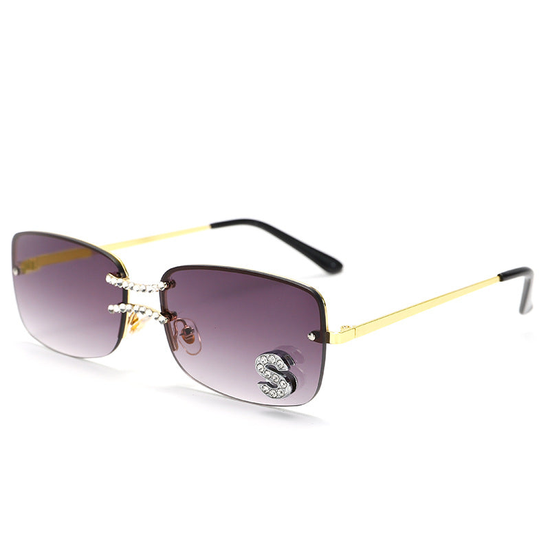 Gradient gray square rimless sunglasses with gold metal frame and crystal S accent
