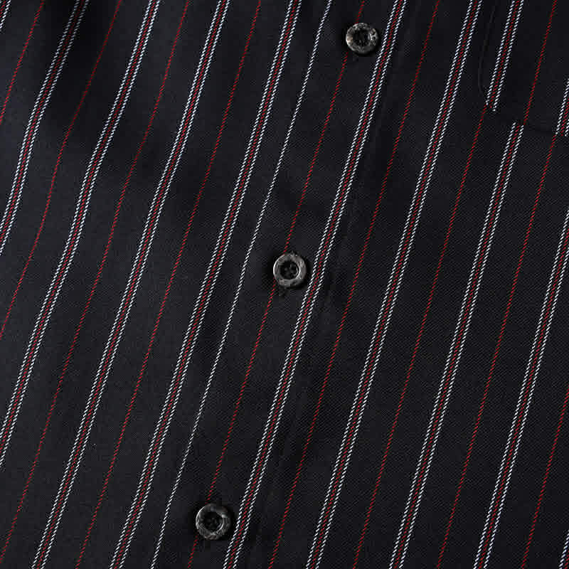 Close-up of front button placket on men’s black retro striped loose fit casual shirt showing premium buttons and stripe alignment.
