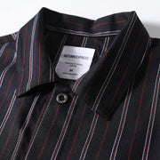 Classic collar detail of men’s black retro striped loose fit short sleeve casual shirt with clean structured design.
