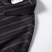 Side seam detail of men’s black retro striped loose fit casual shirt featuring durable stitching and relaxed silhouette.
