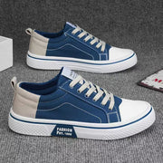 Men’s Korean-style canvas sneakers in blue.