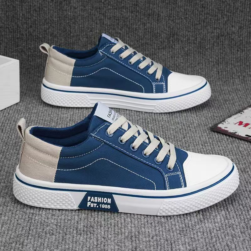Men’s Korean-style canvas sneakers in blue.