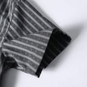 Close-up of sleeve hem on gray retro Cuban collar striped short sleeve shirt featuring premium stitching and relaxed fit construction.
