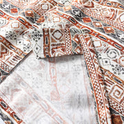 Interior fabric detail of Hawaiian print Cuban collar shirt showing material construction.

