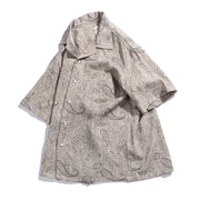 Side angle view of men’s paisley Cuban collar casual shirt
